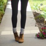 wear ankle boots with layered socks and leggings